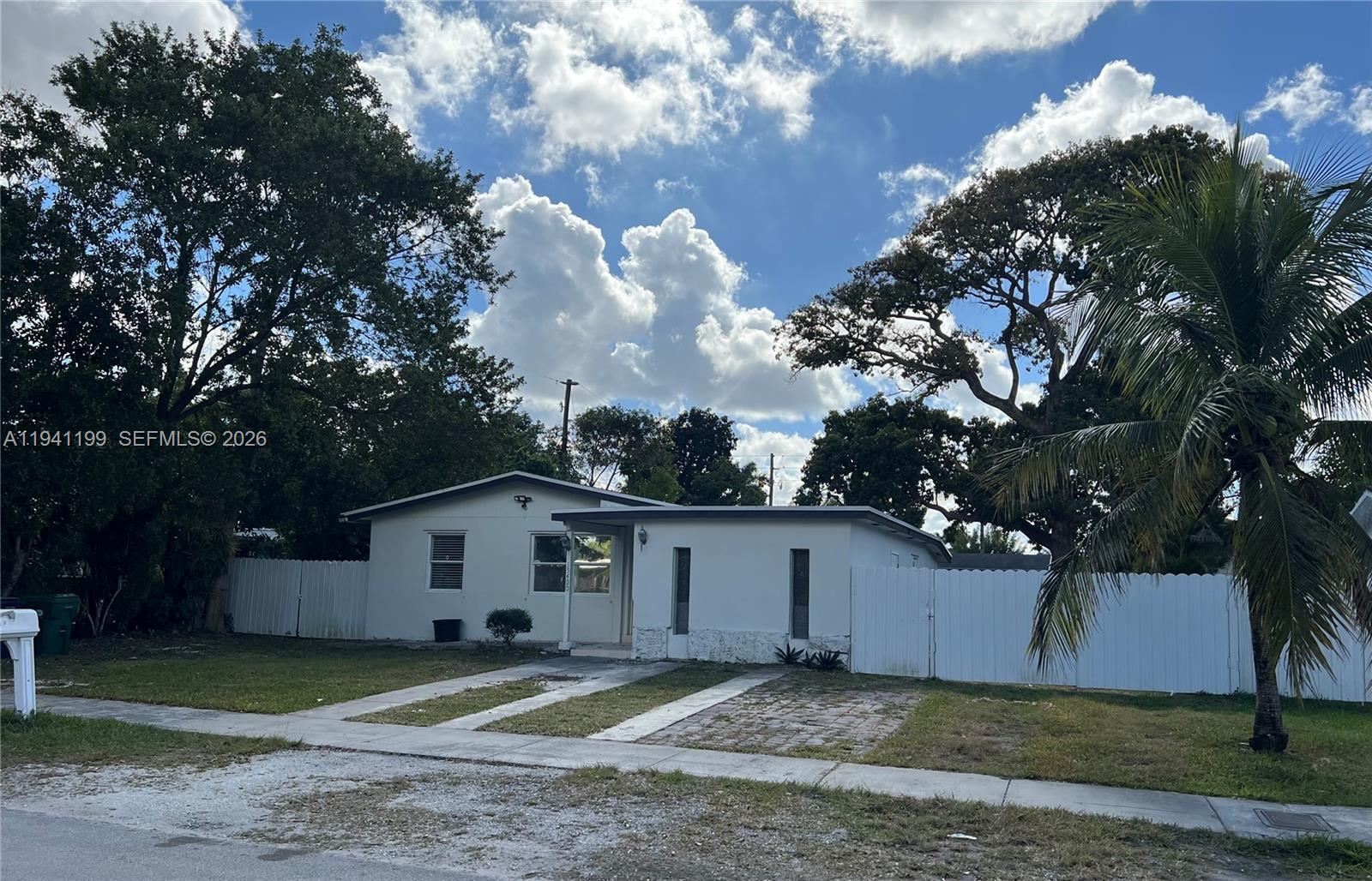 15400 Southwest 295th Street Homestead, FL 33033 - Photo 2 of 38 a view of a house with a backyard