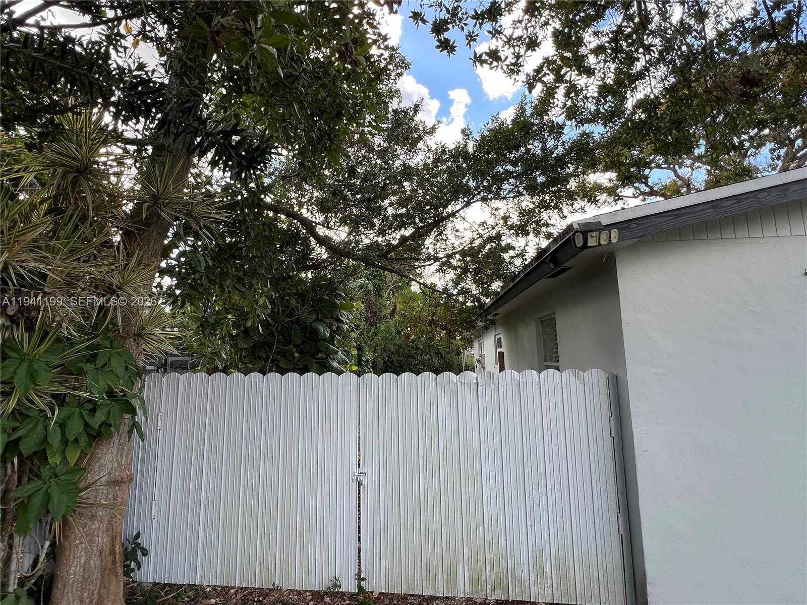 15400 Southwest 295th Street Homestead, FL 33033 - Photo 35 of 38 a view of a wooden fence