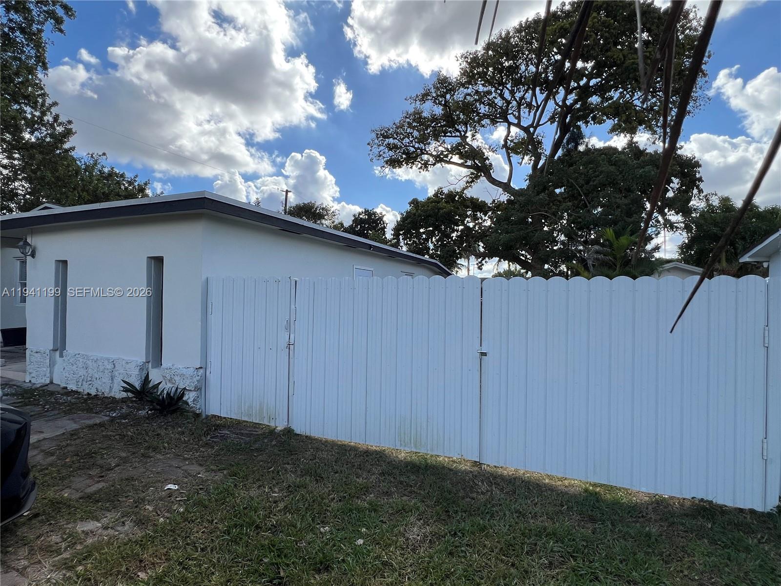 15400 Southwest 295th Street Homestead, FL 33033 - Photo 6 of 38 a backyard of a house