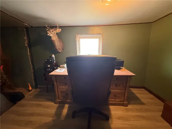 a view of a workspace with furniture