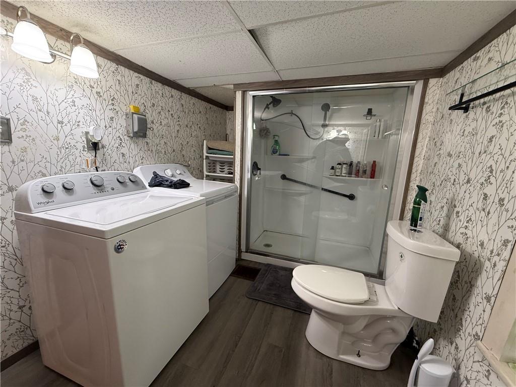 225 Old Ferry Rices Landing, PA 15357 - Photo 19 of 30 a white toilet sitting next to a bathroom sink