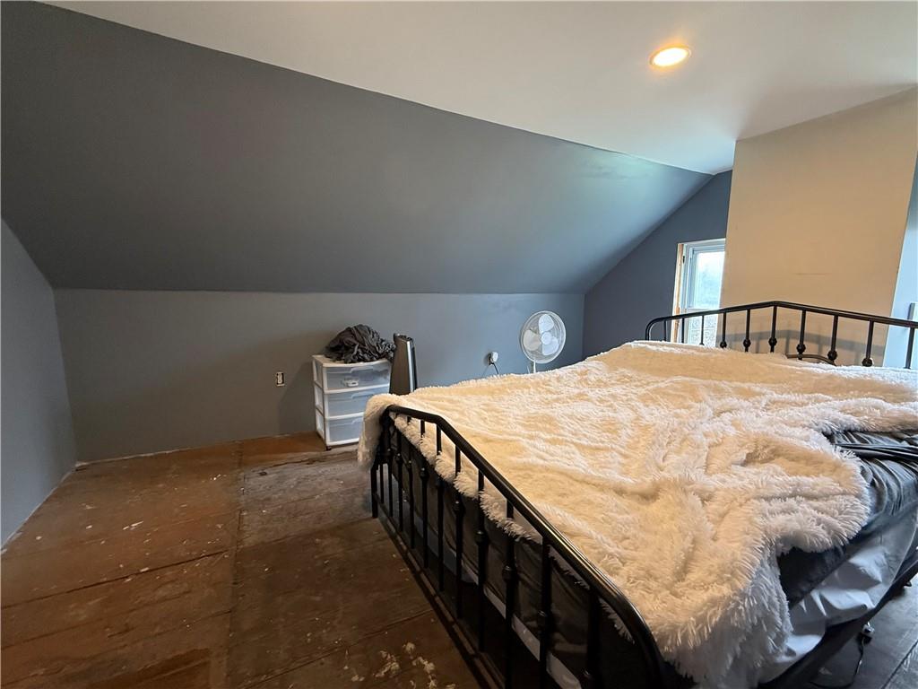 225 Old Ferry Rices Landing, PA 15357 - Photo 23 of 30 a bed sitting in a bedroom and balcony