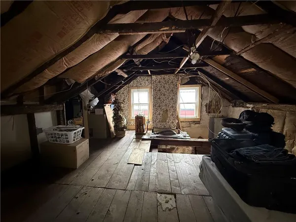 a kitchen with a stove and a refrigerator