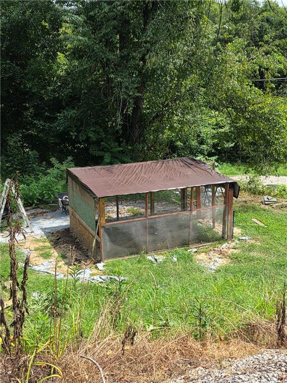 225 Old Ferry Rices Landing, PA 15357 - Photo 30 of 30 a backyard of a house with yard table and chairs