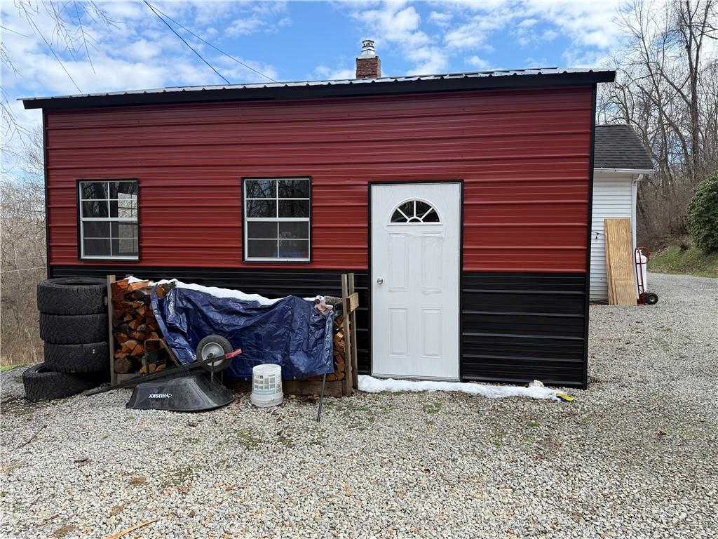 225 Old Ferry Rices Landing, PA 15357 - Photo 4 of 30 a front view of a house with furniture