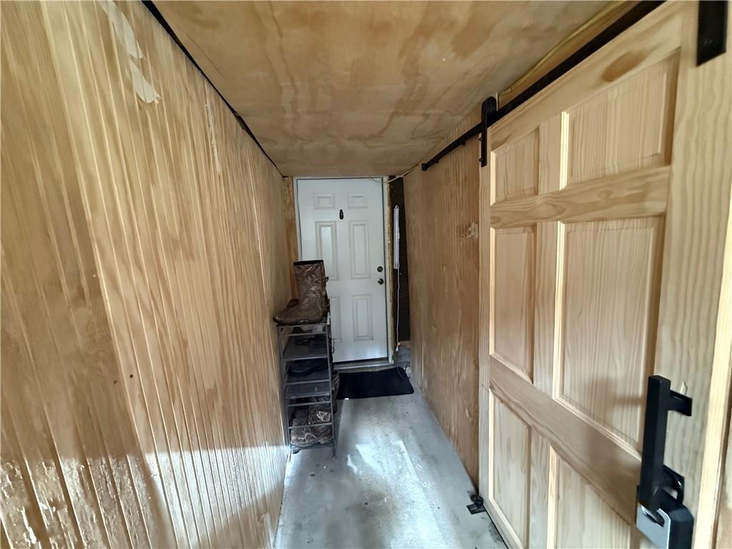 225 Old Ferry Rices Landing, PA 15357 - Photo 5 of 30 a view of a hallway with wooden floor and staircase