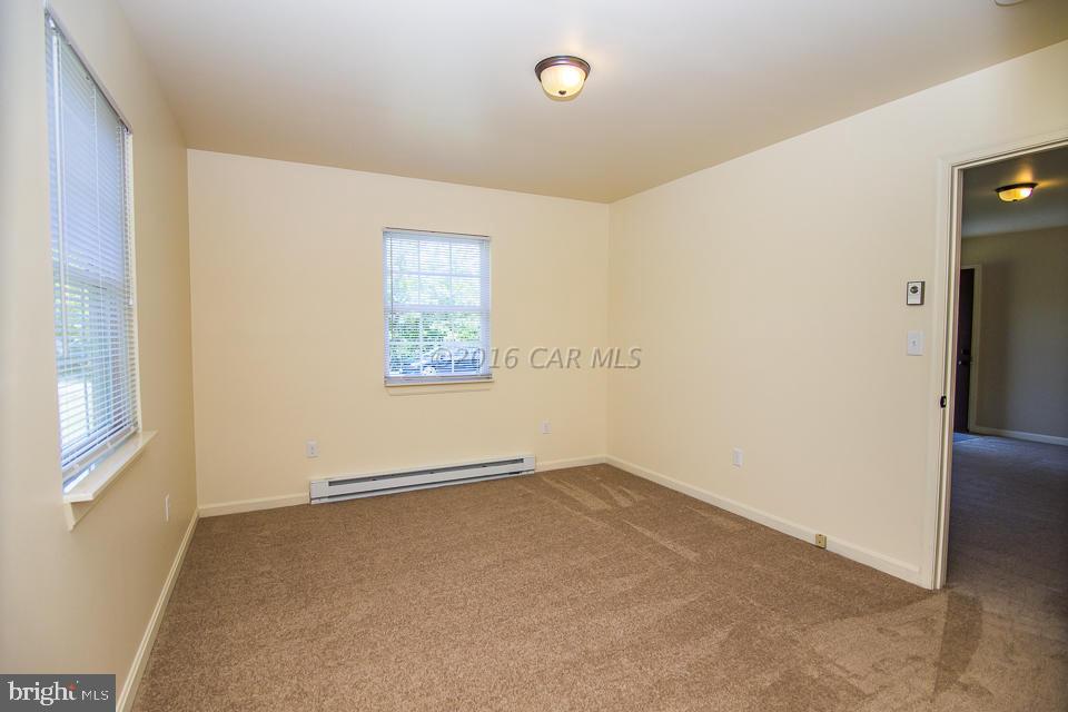 29890 Deal Island Road Princess Anne, MD 21853 - Photo 20 of 32 an empty room with windows