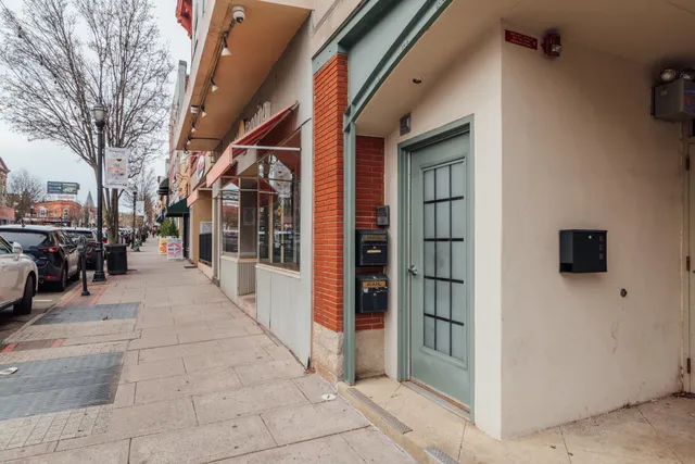 a view of a pathway along the building