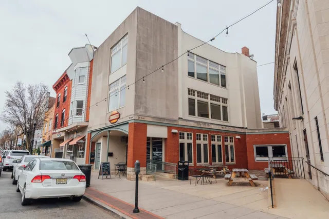 a car parked in front of a building