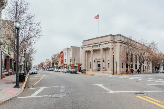 a view of a building with a street