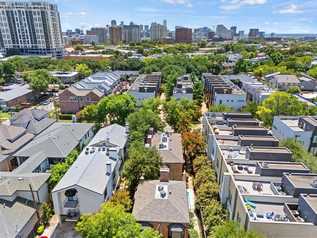 a view of a city with tall buildings