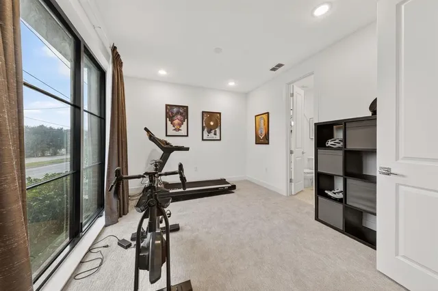a view of a room with gym equipment