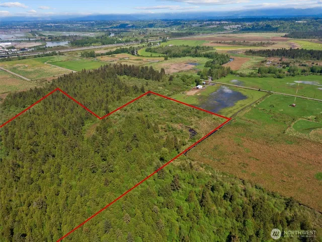 a view of a water with a mountain in the background