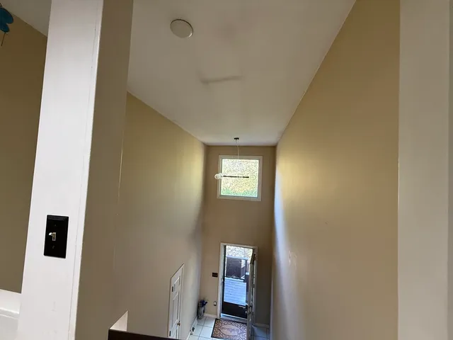 a view of a livingroom from a hallway