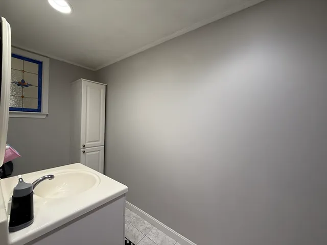 a bathroom with a sink and a vanity