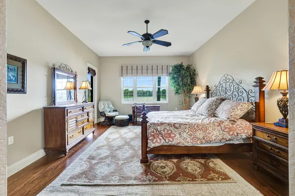 a bed room with a bed furniture and a window