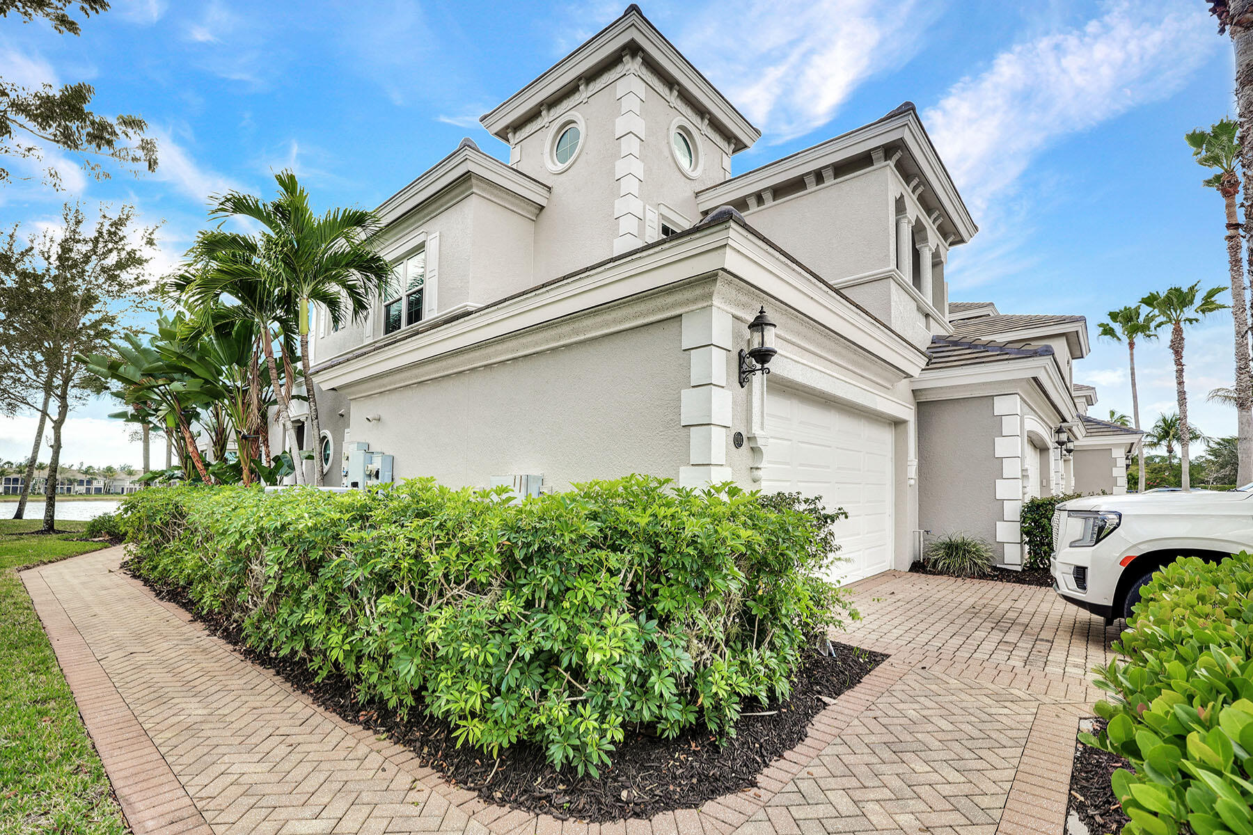 9234 Tesoro, Unit 101 Naples, FL 34114 - Photo 4 of 25 a front view of a house with garden