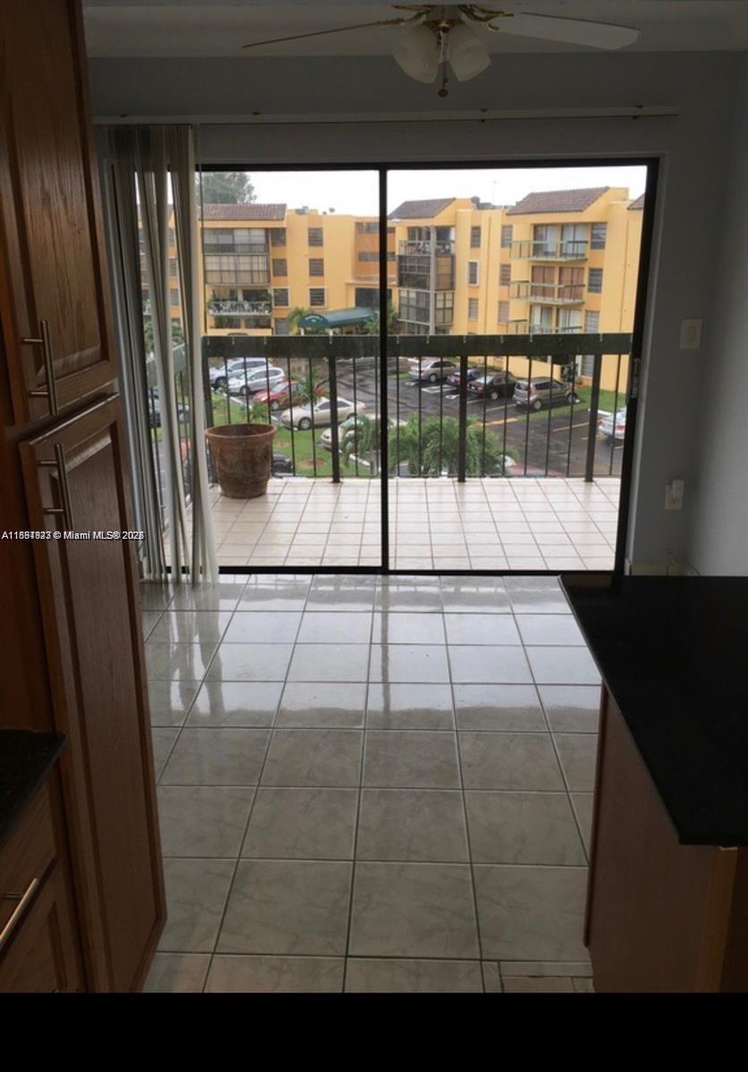 1300 Southwest 122nd Avenue, Unit 4072 Miami, FL 33184 - Photo 8 of 11 a view of empty room with wooden floor