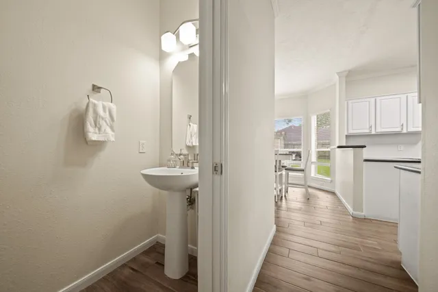 a view of a kitchen from the hallway