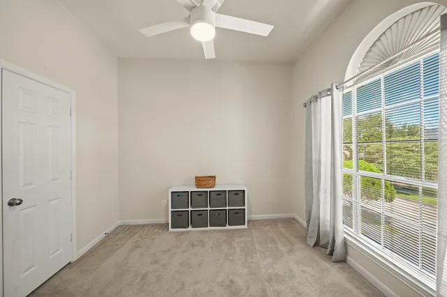 an empty room with windows