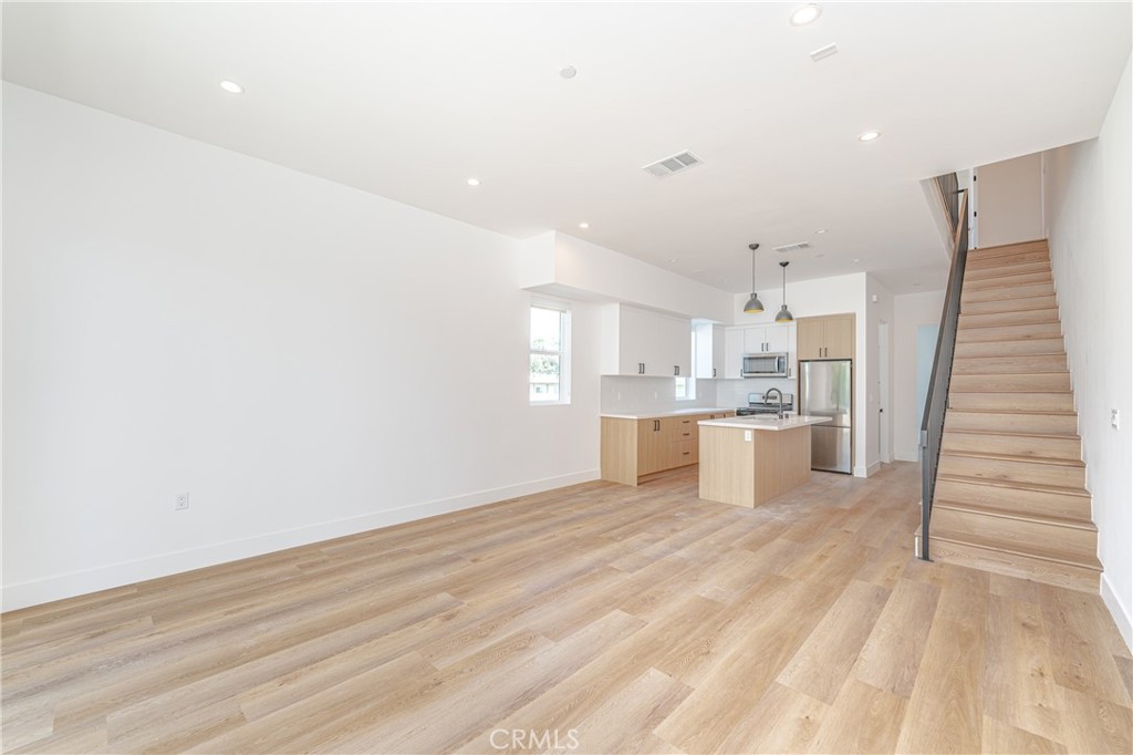 614 1/2 North Rampart Boulevard, Unit 1/2 Silver Lake, CA 90026 - Photo 19 of 41 a view of kitchen with wooden floor