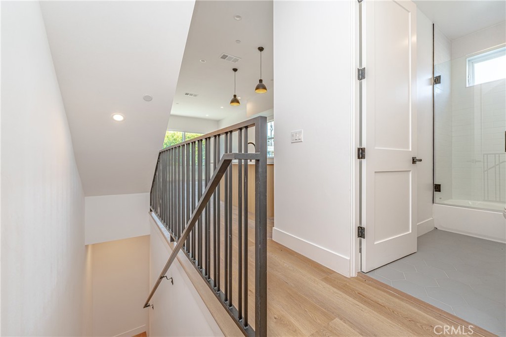 614 1/2 North Rampart Boulevard, Unit 1/2 Silver Lake, CA 90026 - Photo 23 of 41 a view of a hallway with staircase