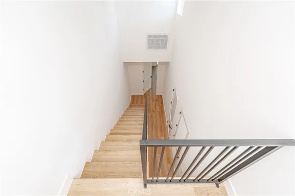 a view of a hallway with staircase
