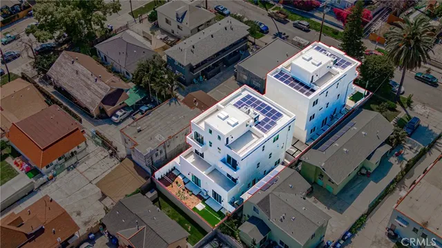 an aerial view of a house with a outdoor space