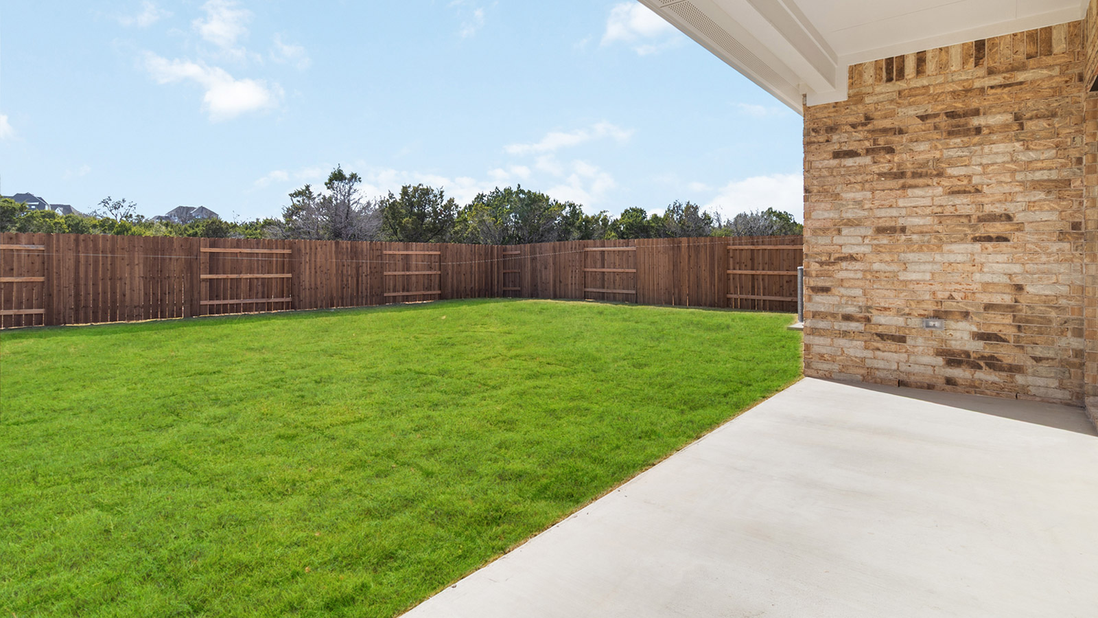 2560 Whittler Road Leander, TX 78641 - Photo 19 of 30 a view of a backyard with a garden