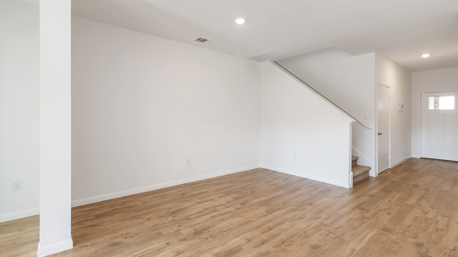 2560 Whittler Road Leander, TX 78641 - Photo 6 of 30 a view of empty room with wooden floor
