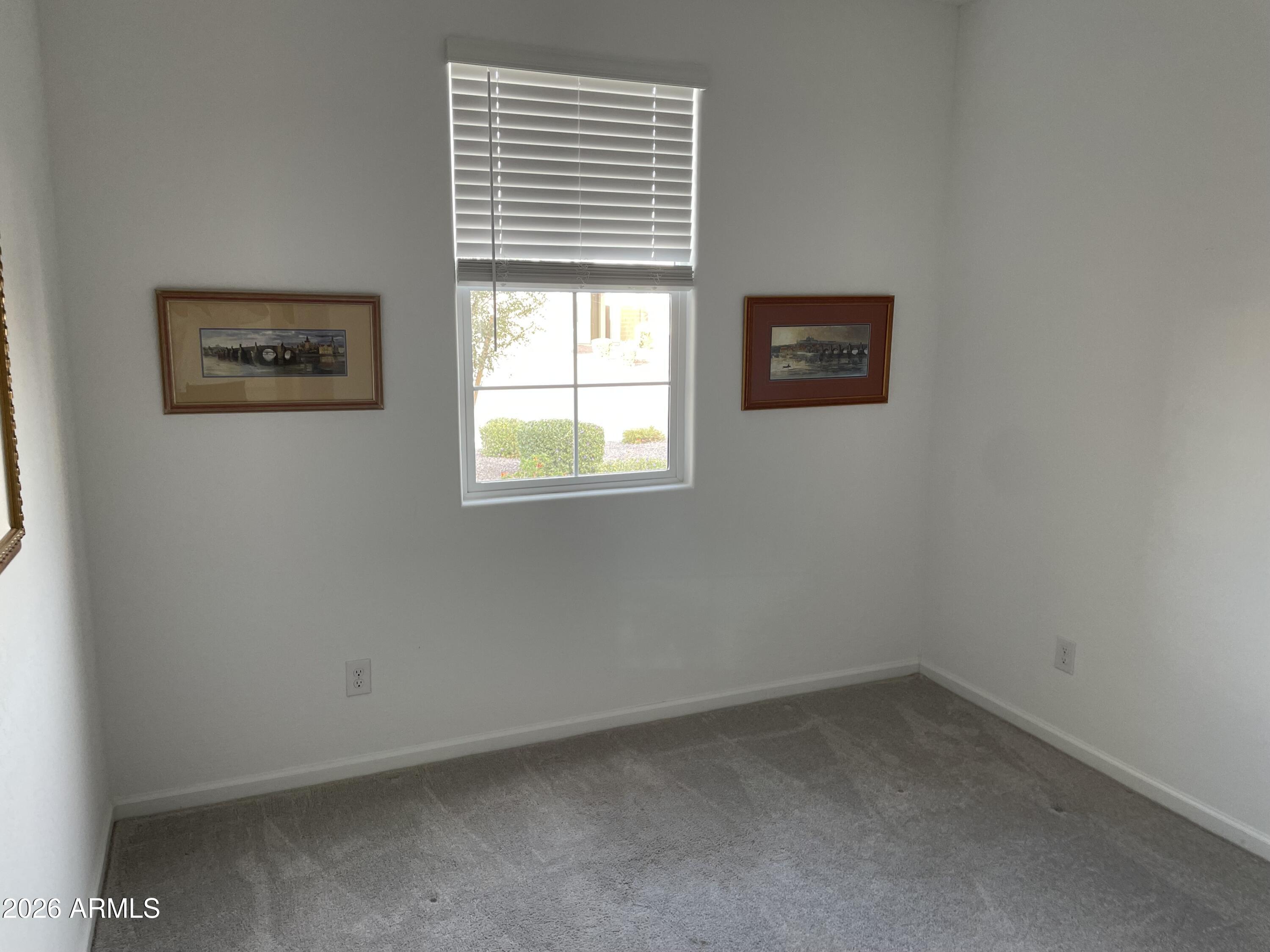 3009 East Riding Boot Way San Tan Valley, AZ 85140 - Photo 15 of 21 an empty room with a window