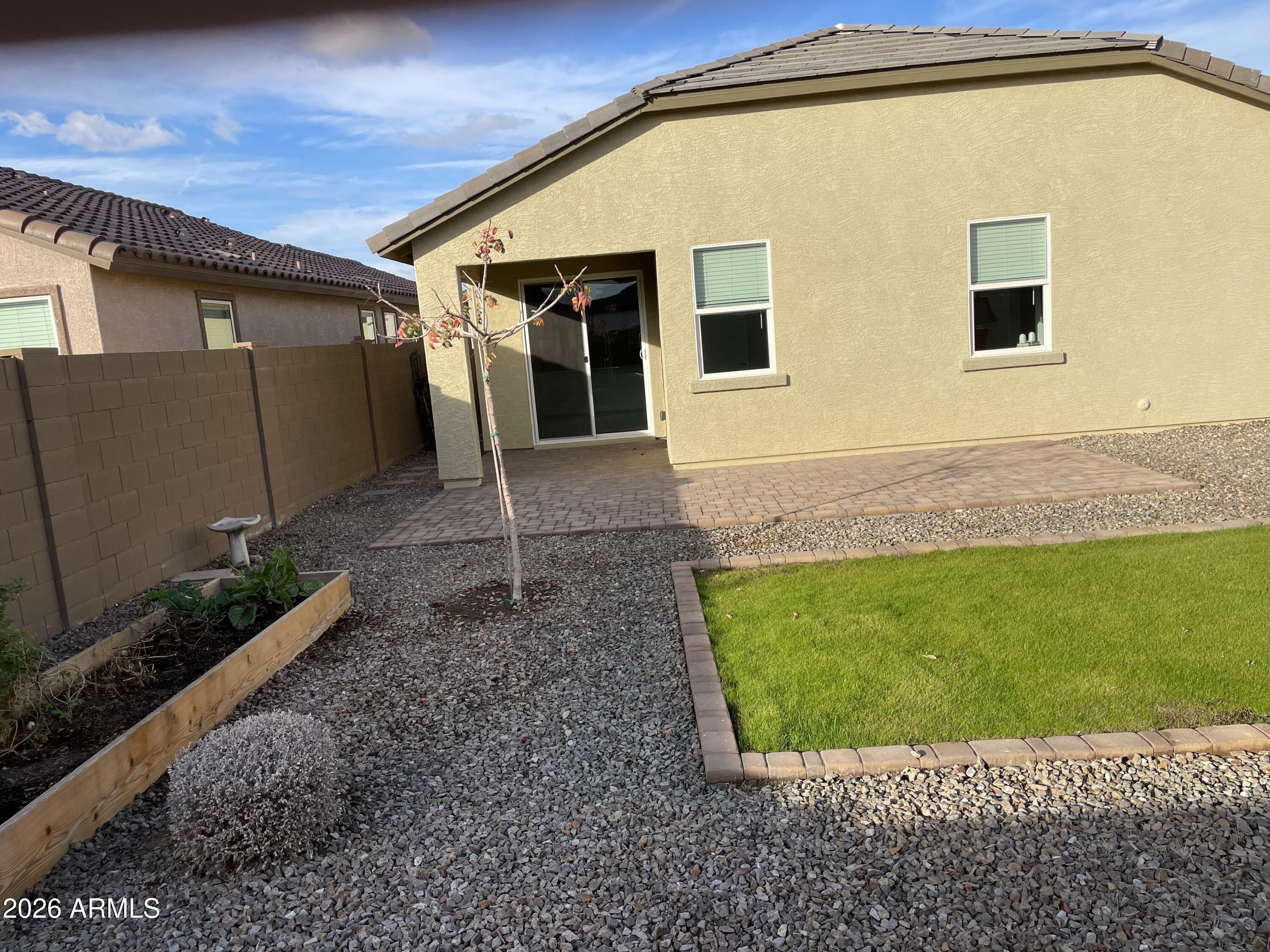 3009 East Riding Boot Way San Tan Valley, AZ 85140 - Photo 18 of 21 a view of a house with a backyard