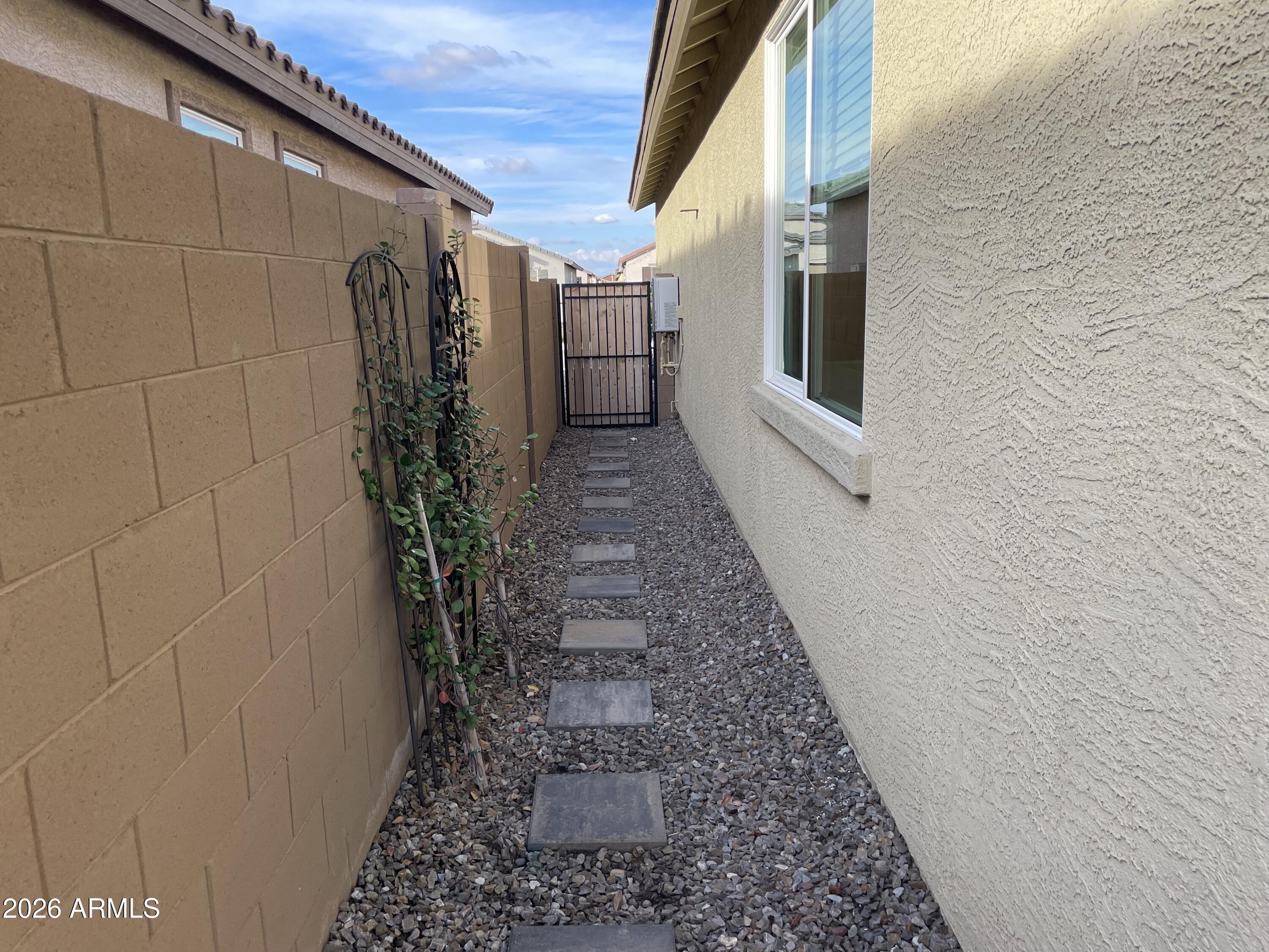 3009 East Riding Boot Way San Tan Valley, AZ 85140 - Photo 20 of 21 a view of a pathway of a house