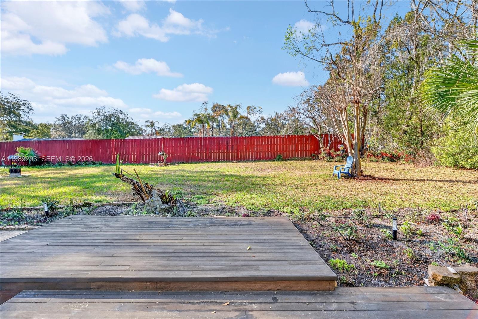 8435 Northwest 6 Avenue Gainesville, FL 32607 - Photo 12 of 52 Backyard two level wood deck.