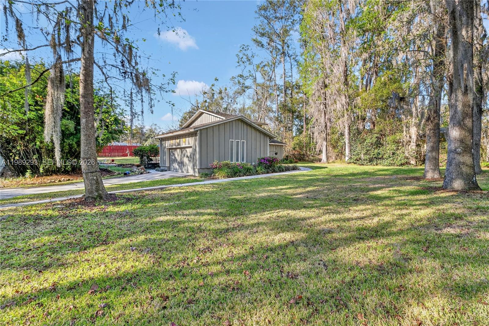8435 Northwest 6 Avenue Gainesville, FL 32607 - Photo 5 of 52 Large front yard with Oaks and Pines.