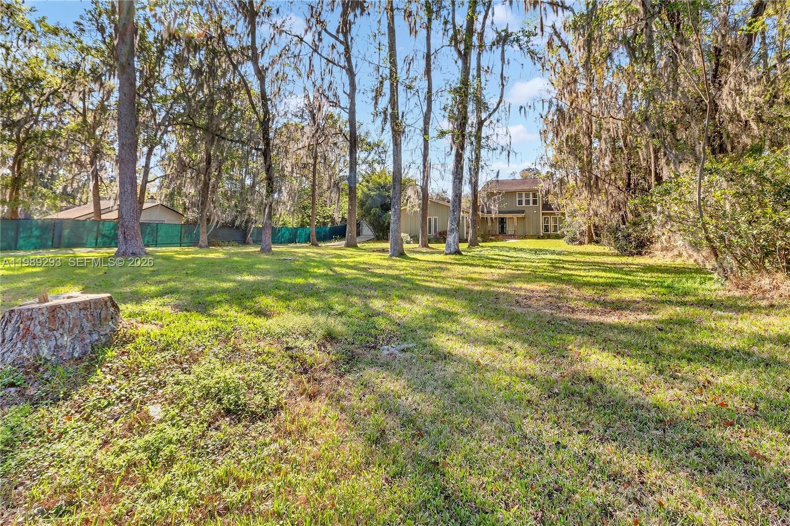 8435 Northwest 6 Avenue Gainesville, FL 32607 - Photo 8 of 52 .77 of an acre. House sits back from street.