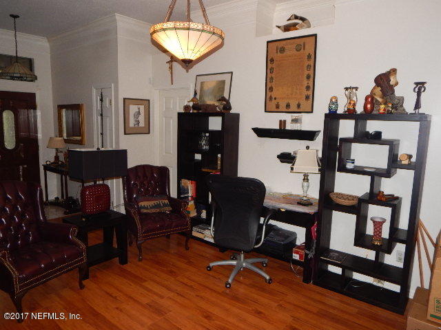 3133 Nautilus Road Middleburg, FL 32068 - Photo 7 of 17 a view of a workspace with furniture and a window