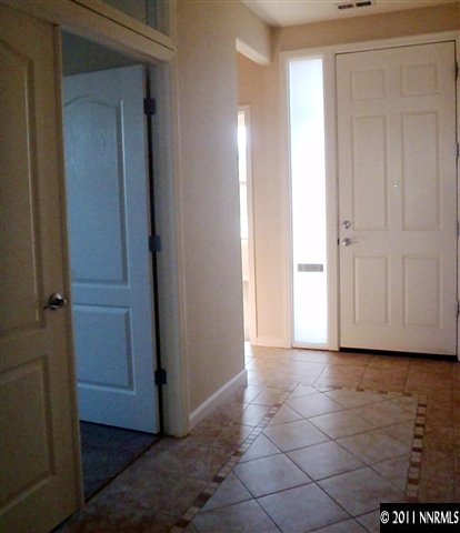 14045 Tagor Road Reno, NV 89521 - Photo 2 of 13 a view of a hallway with closet area