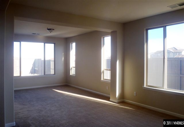 14045 Tagor Road Reno, NV 89521 - Photo 3 of 13 an empty room with windows