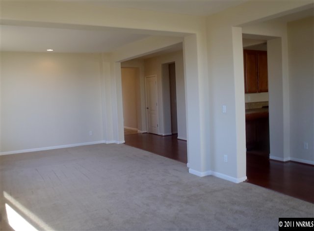 14045 Tagor Road Reno, NV 89521 - Photo 4 of 13 a view of an empty room and a window