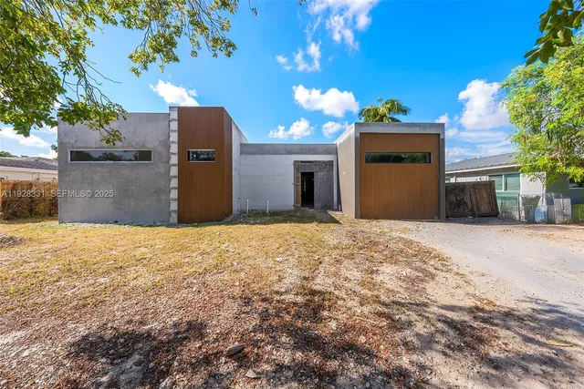 a view of a house with a garage