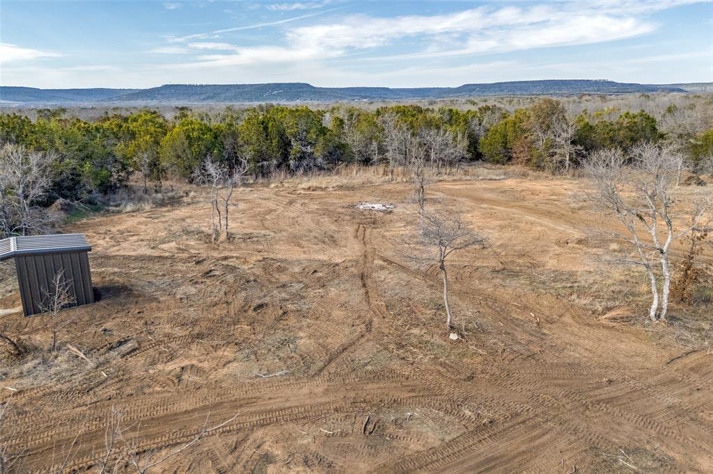 1500 Brown Road Palo Pinto, TX 76484 - Photo 12 of 16 a view of an outdoor space and a yard