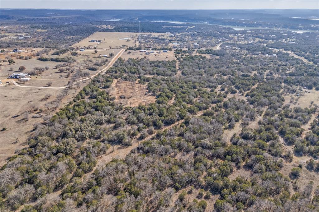 1500 Brown Road Palo Pinto, TX 76484 - Photo 7 of 16 an aerial view of houses with a yard