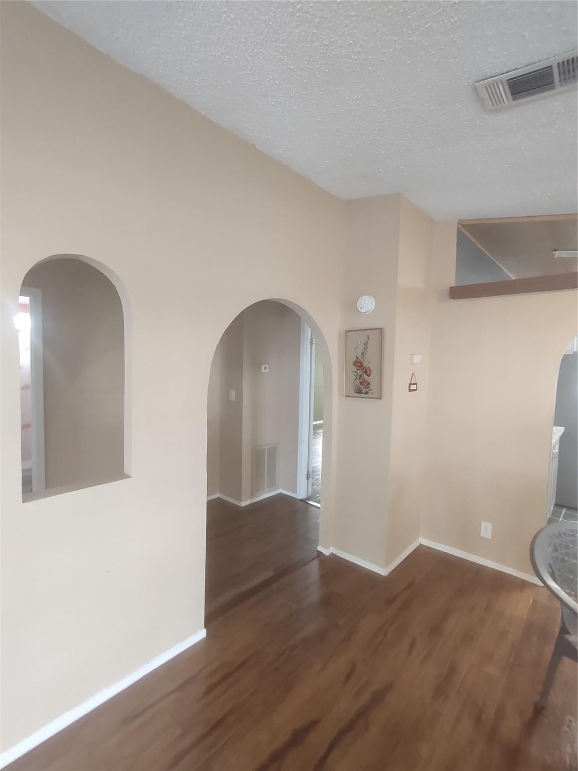1576 Southwest 35th Circle Okeechobee, FL 34974 - Photo 12 of 42 a view of empty room with wooden floor