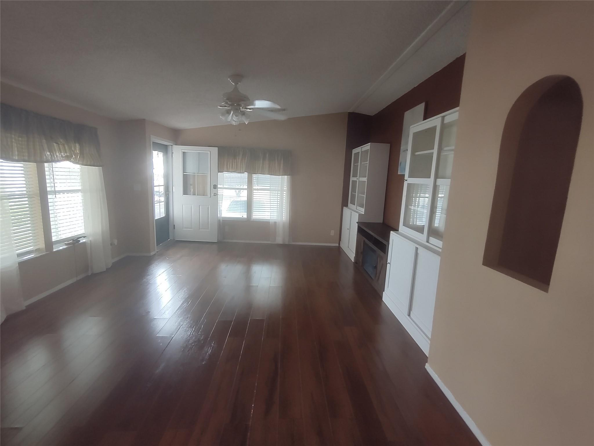 1576 Southwest 35th Circle Okeechobee, FL 34974 - Photo 16 of 42 a view of entryway and hall with wooden floor