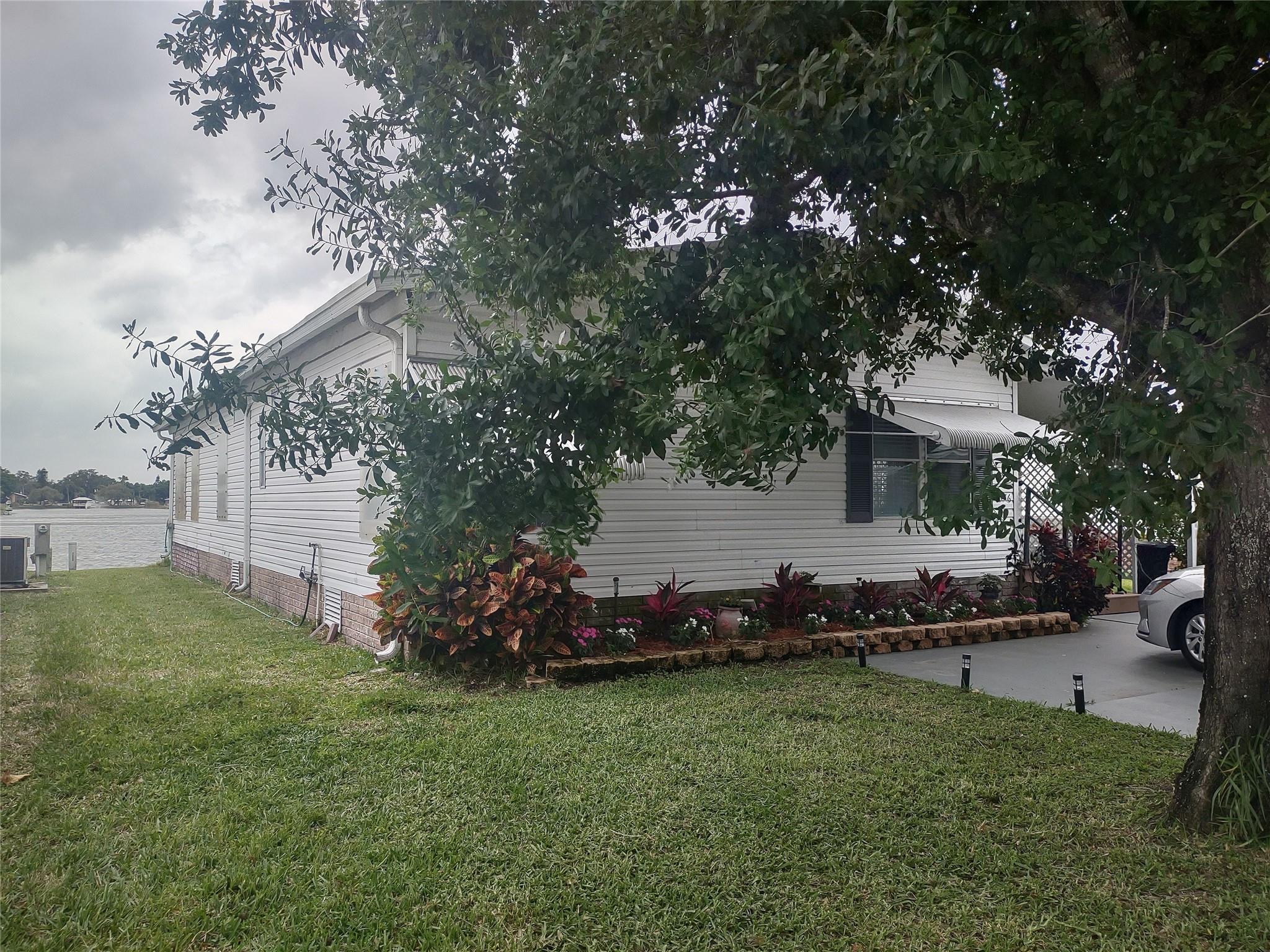 1576 Southwest 35th Circle Okeechobee, FL 34974 - Photo 2 of 42 a view of a house with a back yard