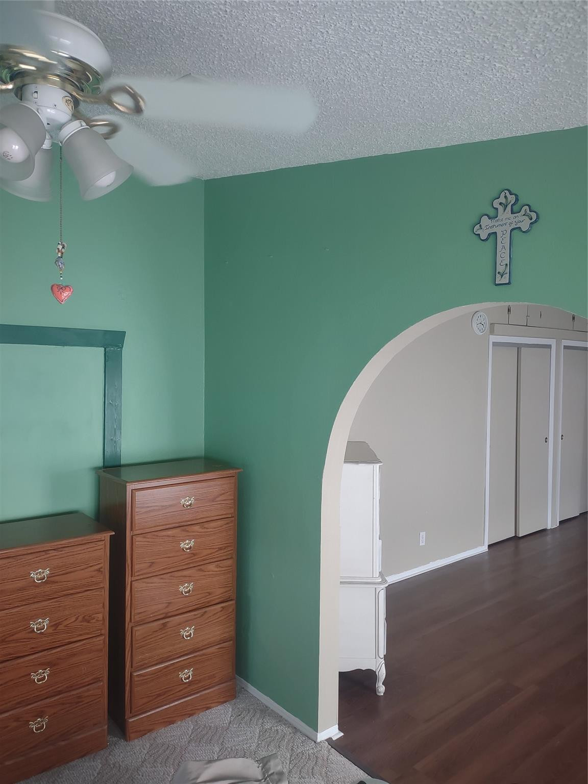 1576 Southwest 35th Circle Okeechobee, FL 34974 - Photo 24 of 42 a view of a room with cabinets and wooden floors