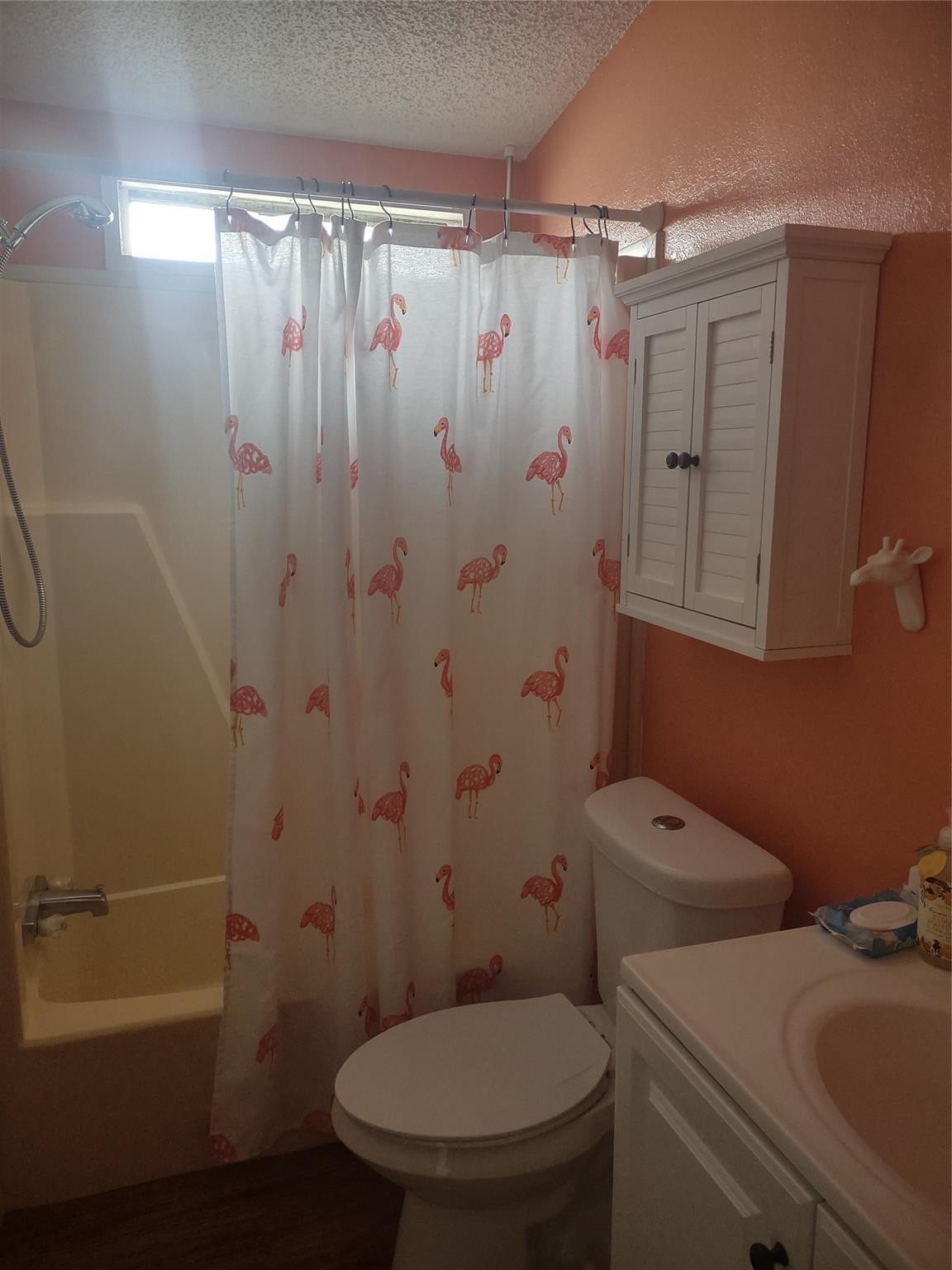 1576 Southwest 35th Circle Okeechobee, FL 34974 - Photo 29 of 42 a bathroom with a toilet and shower