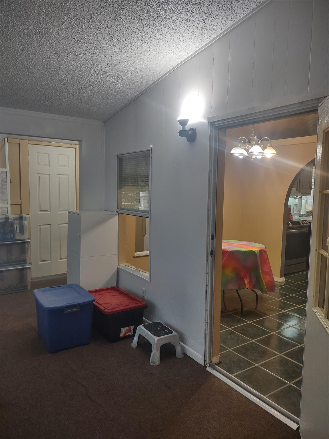1576 Southwest 35th Circle Okeechobee, FL 34974 - Photo 30 of 42 a living room with furniture and a mirror