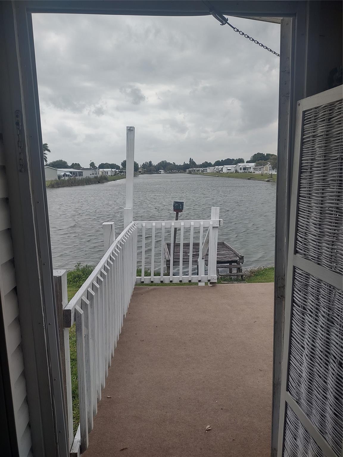 1576 Southwest 35th Circle Okeechobee, FL 34974 - Photo 34 of 42 a view of a balcony with lake view